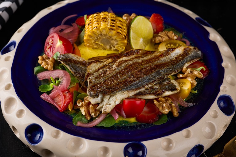 Ruvia Restaurant - grilled sea bream (izgara cipura) served whole with rocket, tomato, walnuts and grilled lemon